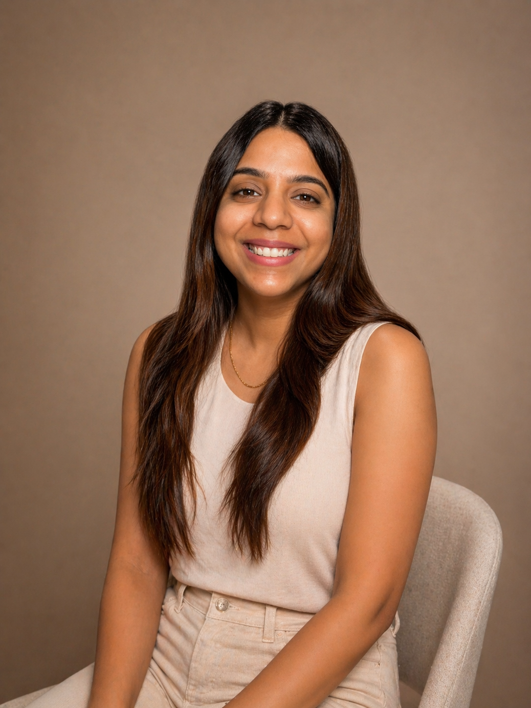 Aashna Narang smiling in a light top